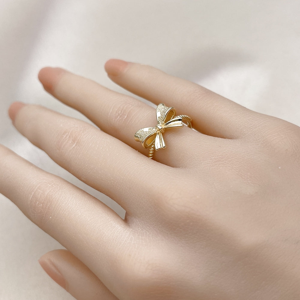 Oro Laminado Elegant Ring, Gold Filled Style Bow Design, Matte Finish, Golden Finish