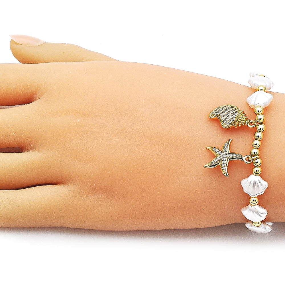 Oro Laminado Fancy Bracelet, Gold Filled Style Star and Snail Design, with Ivory Pearl and White Micro Pave, Polished, Golden Finish